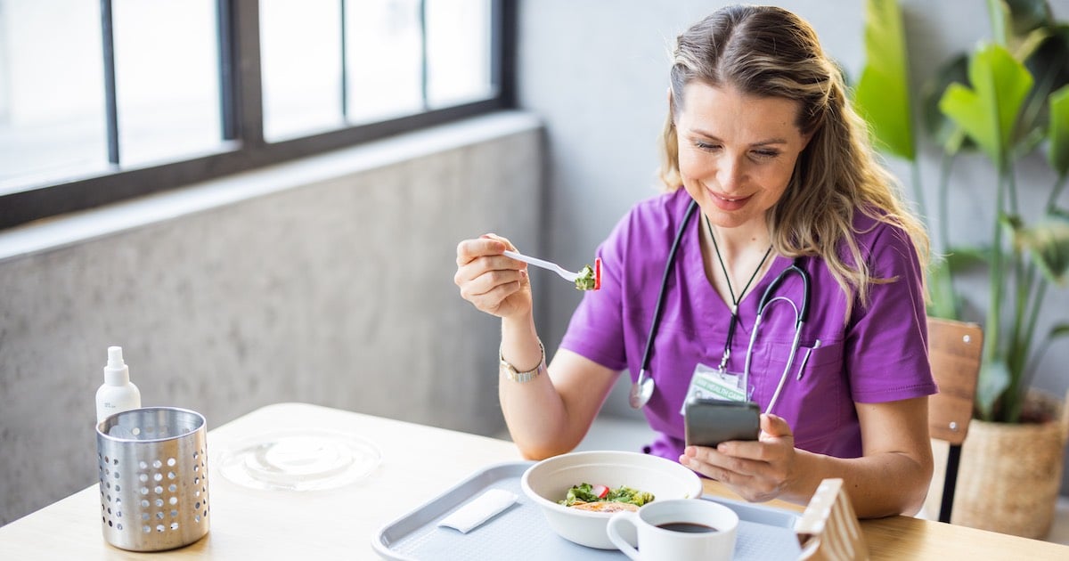 healthcare employee enjoying a nutritious hospital cafeteria meal 