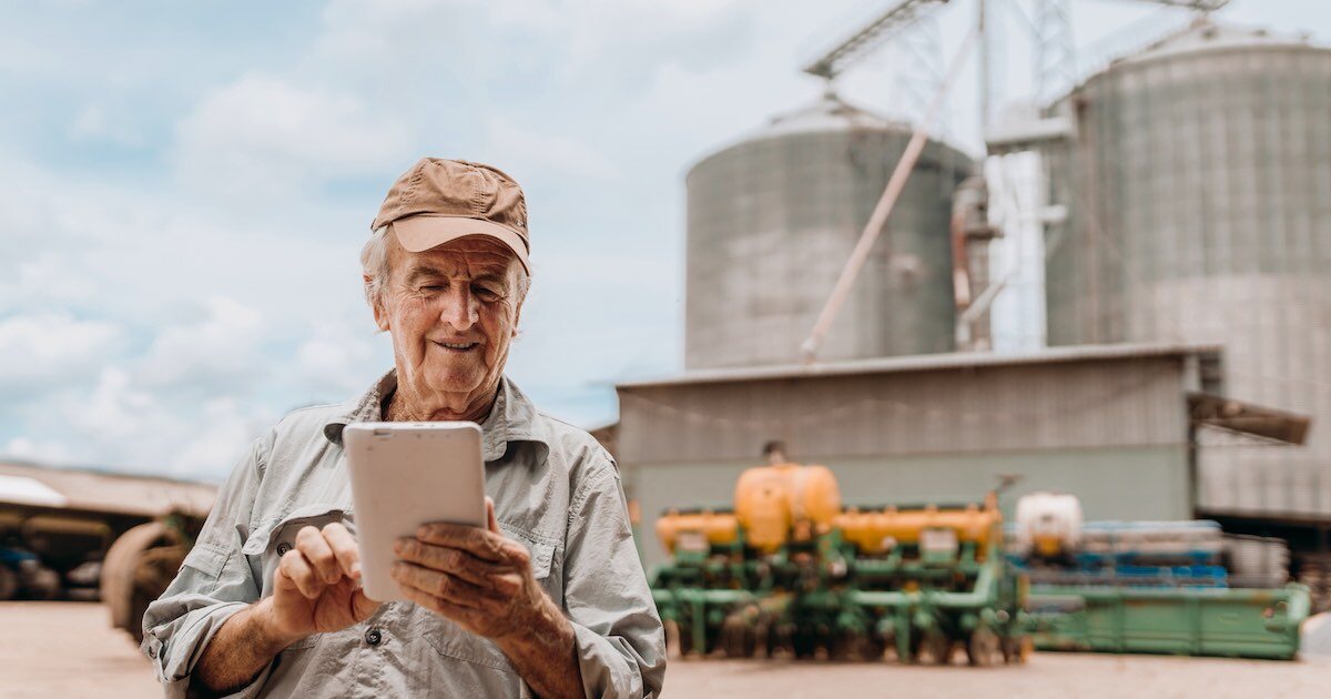 farmer on a farm with a digital tablet
