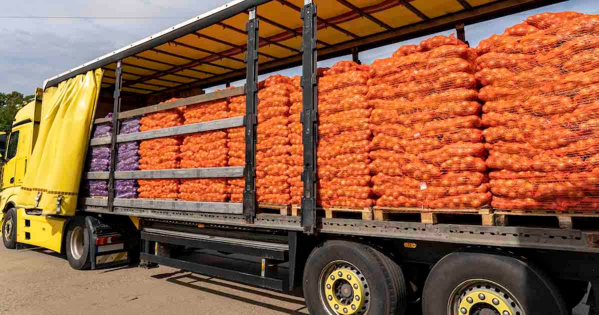 bags of fruit on a truck