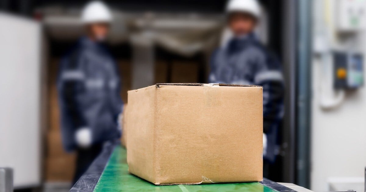 pharmaceutical products on conveyor going into a warehouse