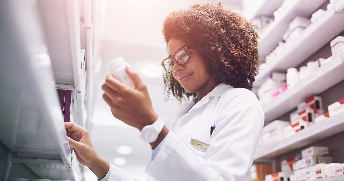 pharmacist inspecting pharmaceutical inventory