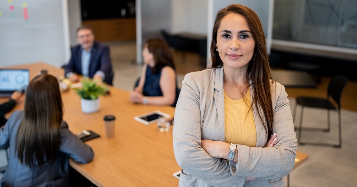 Hospital CFO making decisions in board room