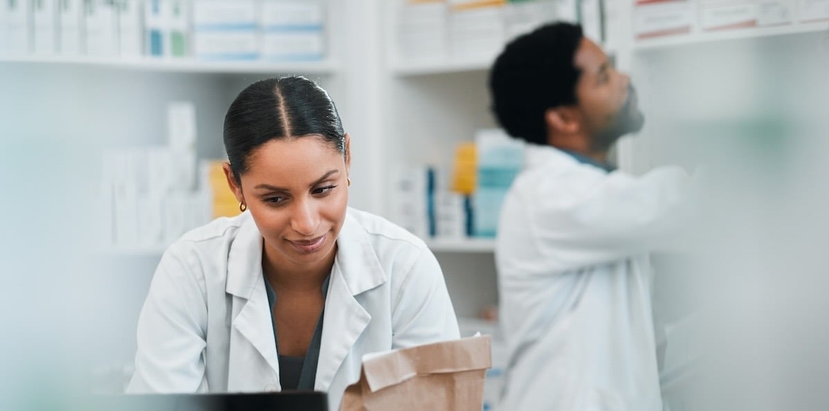 healthcare workers analyzing hospital inventory levels